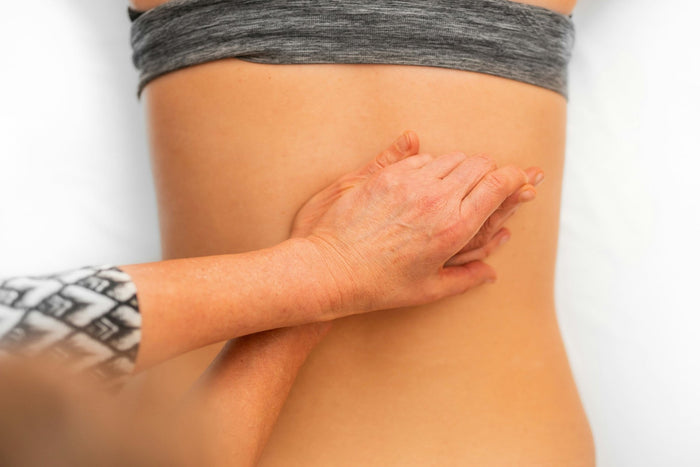 Massage bei Bandscheibenvorfall am unteren Rücken